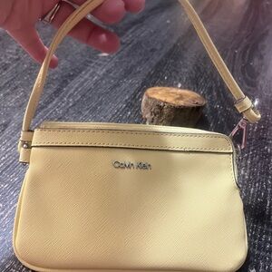 Calvin Klein Light Yellow Wristlet
